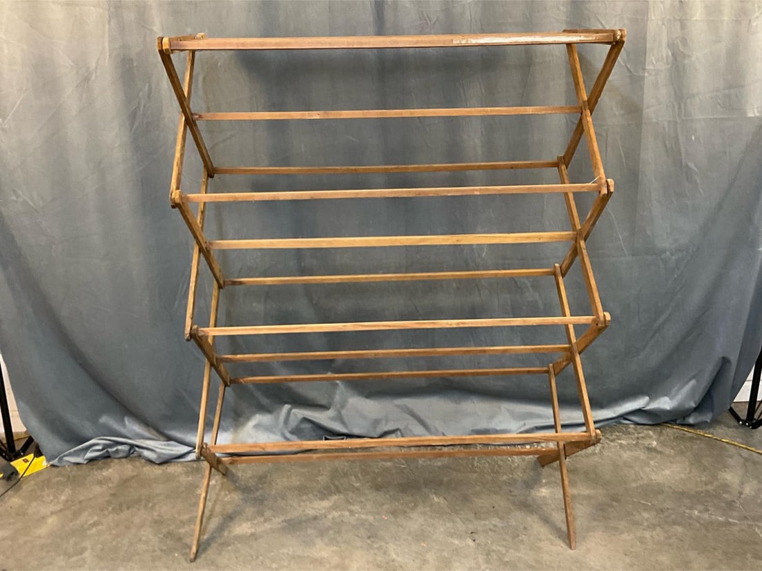 Wash or Drying Rack: Mid-20th century Homemade/Handmade Folding Pine Wash Stand. Fourteen bars. One repaired latch, and wobbly. Measures 43.5 inches wide x 19.25 x 55 inches tall.