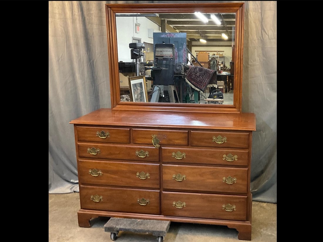 Henkel-Harris Dresser/Chest of Drawers: 1960's-1970's Henkel-Harris Cherry Dresser with detachable mirror and nine drawers. Some wear to finish, otherwise good condition. Measures 54 inches wide x 20 x 69 inches tall.