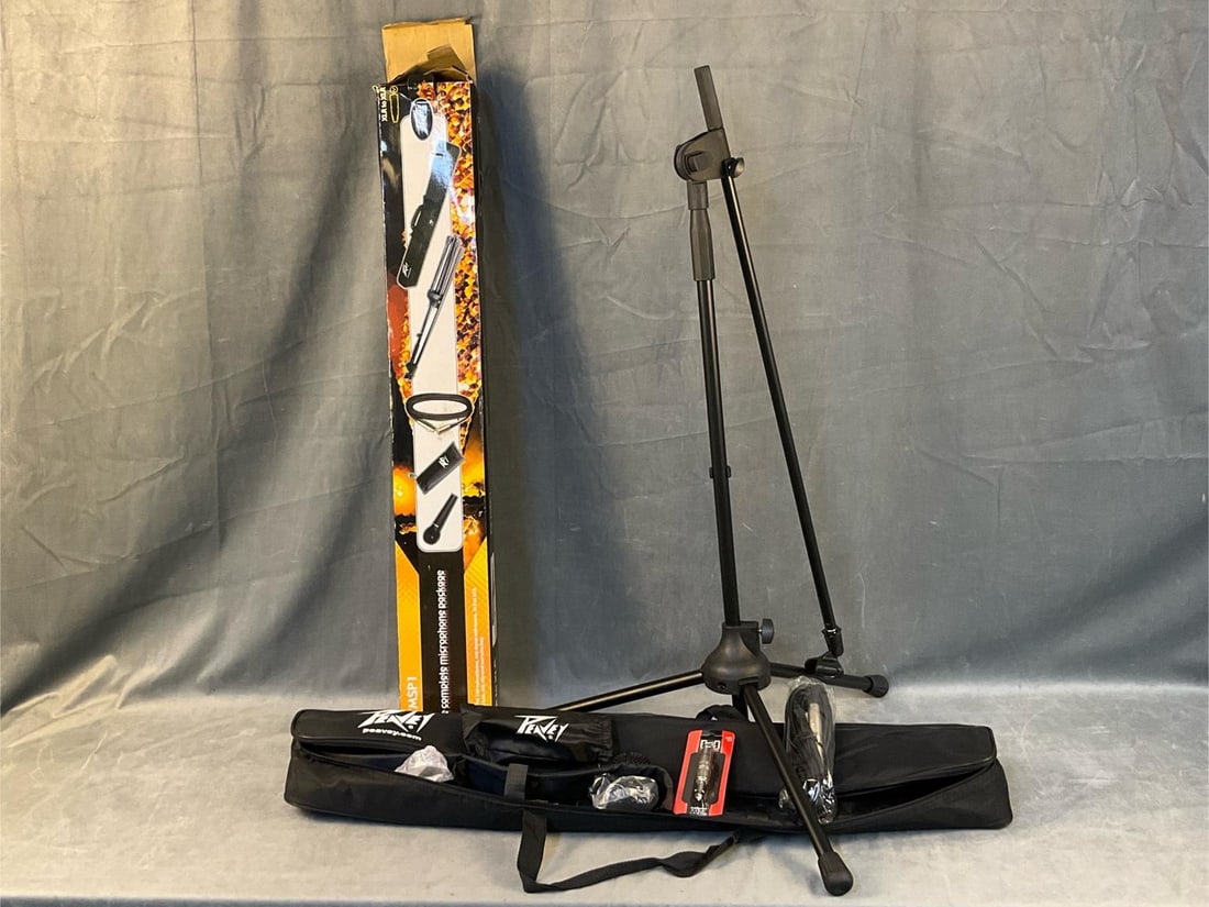 Peavey Microphone Package: Contemporary/modern Peavey Microphone Package in original box. Includes: PVi 100 microphone, mic stand with boom, XLR to XLR cable, mic bag, mic clip and carrying bag. Plus one Adaptor XLR3F to 1/4