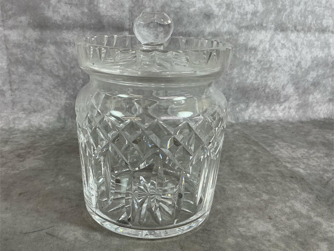 Waterford Biscuit Jar: Vintage crystal biscuit barrel. Lismore design etched glass jar with lid by Waterford. In good condition. Measures 5 inches in diameter x 6 inches tall.
