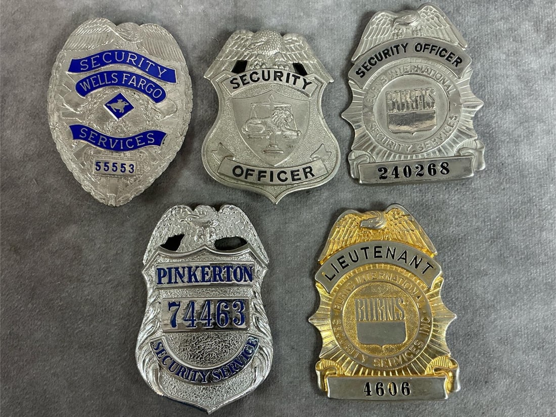 Security Badges: Five vintage security badges. Includes Wells Fargo, Burns, and Pinkerton. In good condition. Wells Fargo measures 2.5 inches wide x 3.25 inches long.