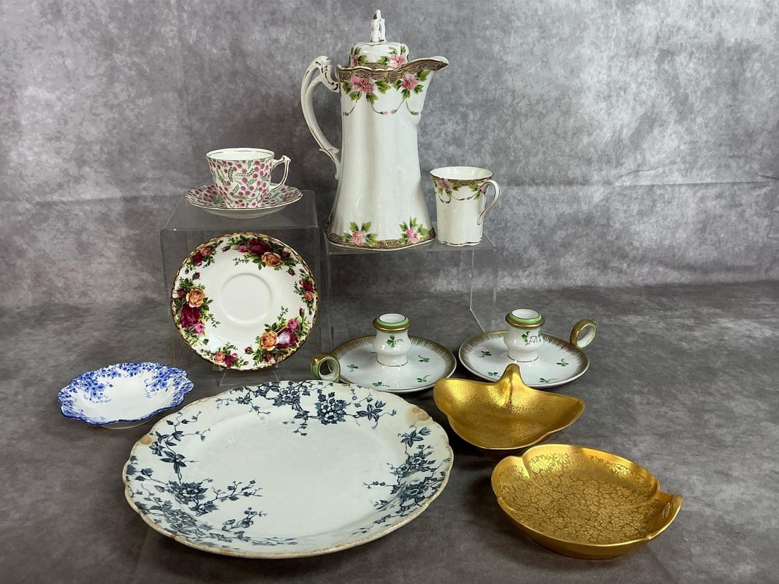 Antique China & Porcelain: Ten early to mid 1900's pieces. Nippon hand painted teapot and cup, Old Royal teacup and saucer, two gold painted Pichard Dishes, two Ardalt clover design candle holders, and more. Dinner plate has ch