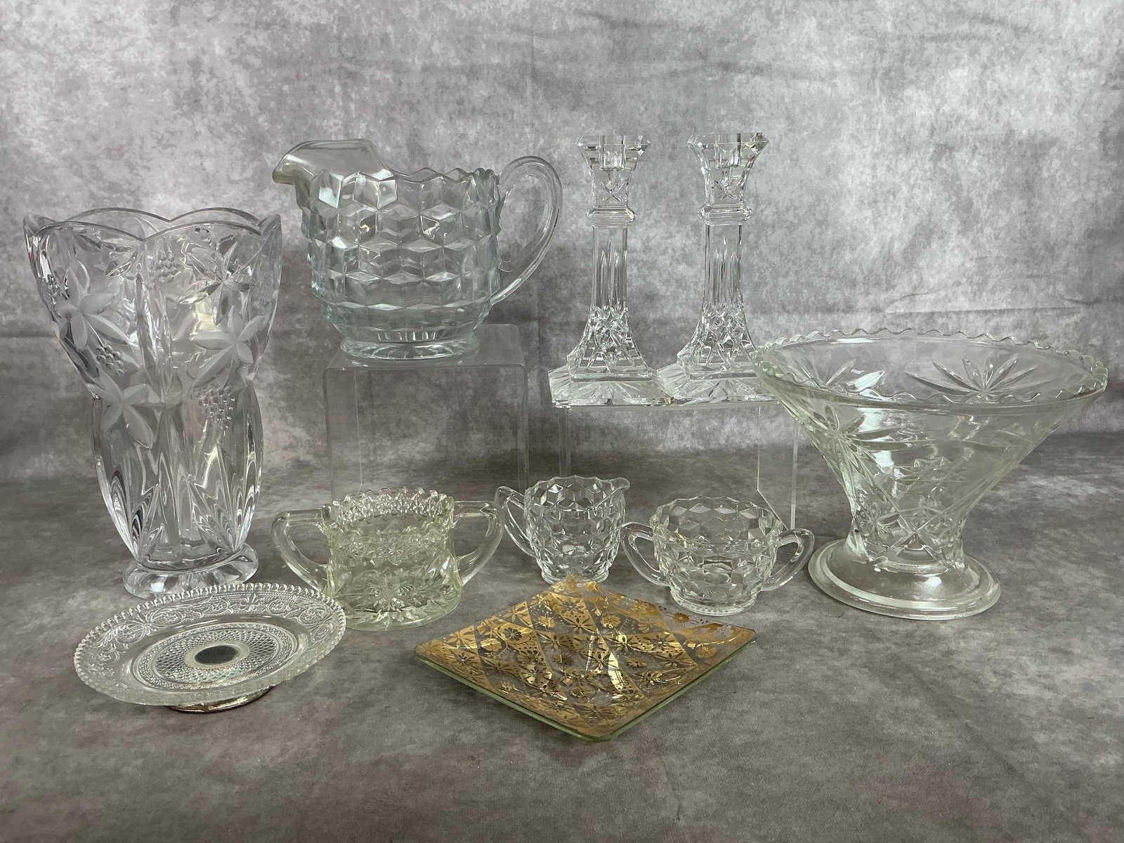 Cut Glass Collectibles: Ten mid to late 1900's pieces. Heavy crystal Mikasa "Garden Terrace" vase, Fostoria glass pitcher with cube motif, and AH Star of David pedestal bowl. Includes pair of Waterford crystal candle