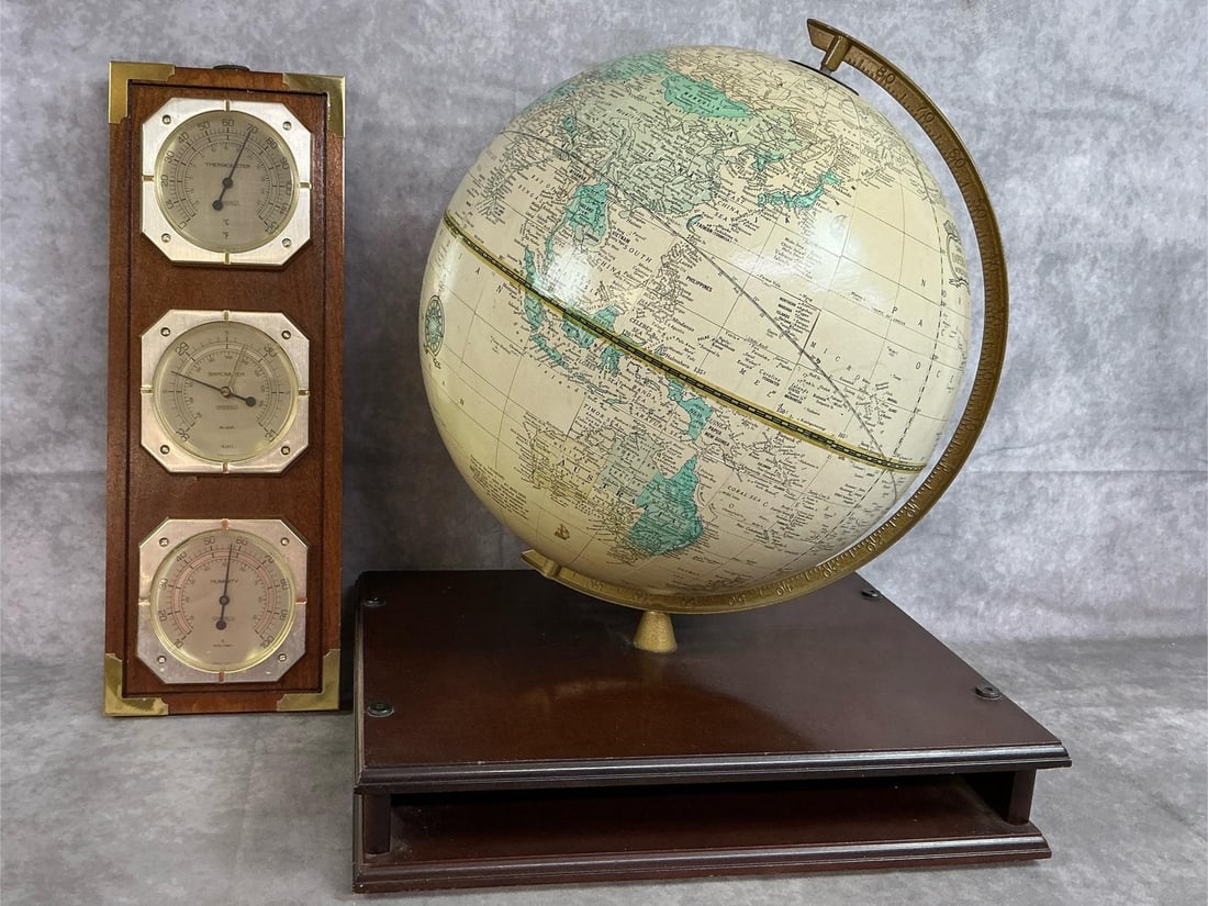 World Globe & Weather Station: Two mid 1900's globe and weather station. Cram's Imperial World Globe mounted on wooden box stand. Wall mount station includes thermometer, barometer, and hygrometer. Both in good condition. Globe