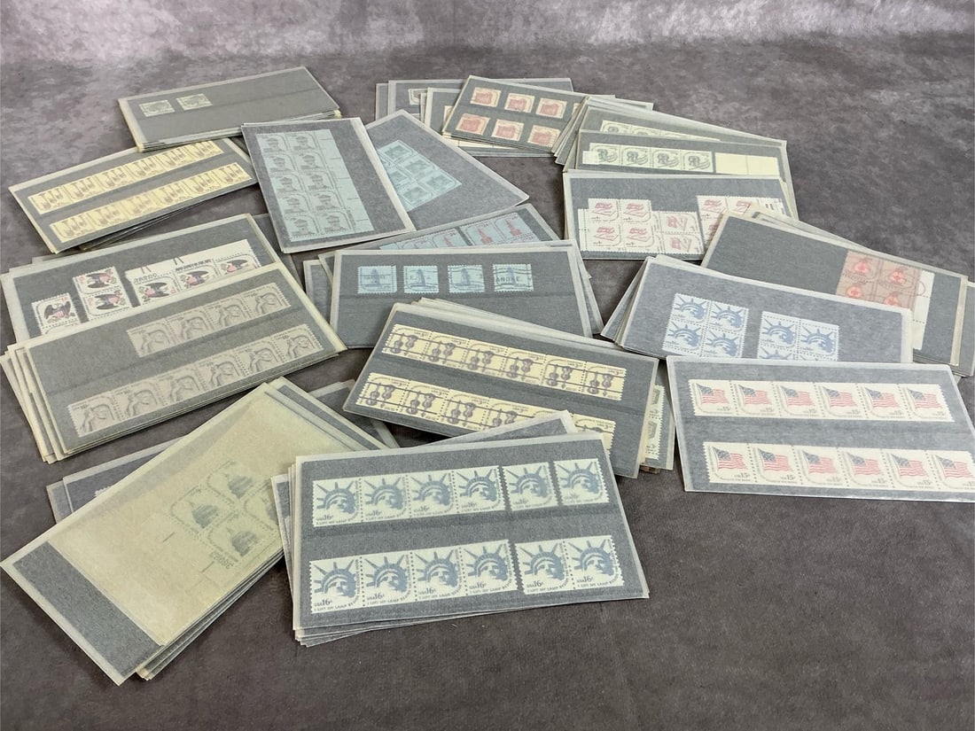 Collector's Postage Stamps: Lot of mid to late 1900's postage stamps. Stamps are packaged by denominations ranging from 1cent - 10 cents, 13 cents, 15 cents, 16 cents, 24 cents, 28 cents, 29 cents, and 30 cents. A few are