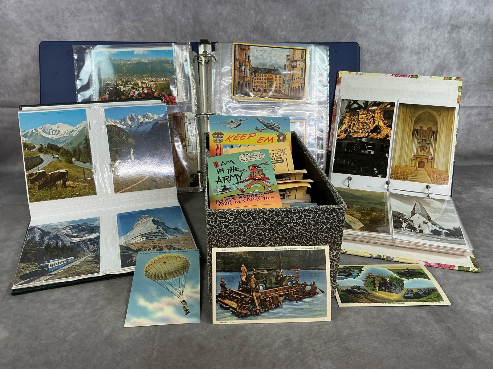 Vintage Postcards: Well over 600 vintage postcards. Themes include military, Swedish, Scandinavian, Shenandoah Valley, Alaska, and more. Box of military postcards contains many duplicates of only nine cards. Most are