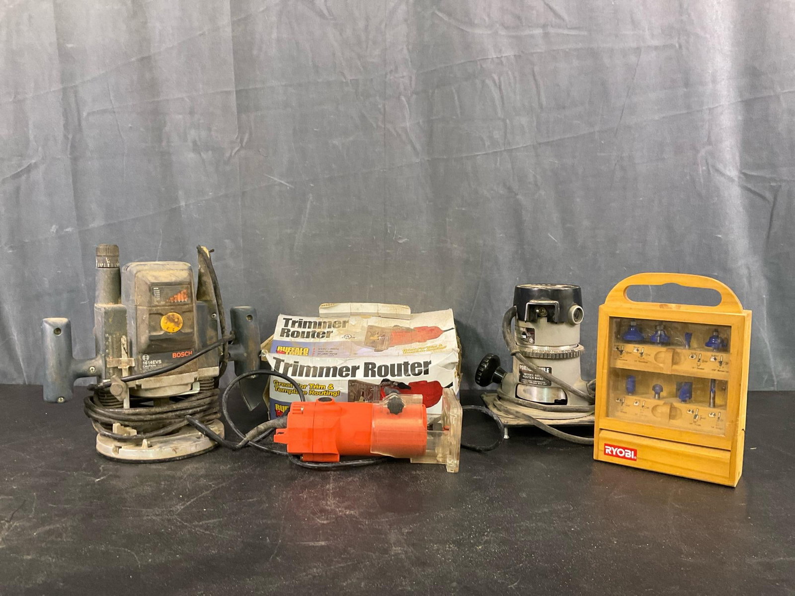 Power Tools/Routers: Circa 2000 Power Tools. One Porter Cable Model 1001 Router Base, working condition. One Buffalo Tools Trimmer Router 1/4” collet, broken plastic sleeve area, otherwise working condition. One