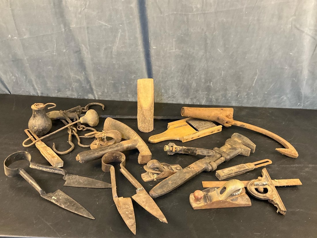 Primitive Tools: Lot of approximately sixteen late 19th century-early 20th century hand tools. One cast iron balance scale, two sheep shears, two hand planes, two sliding bevels, one wrench, one level, and more.