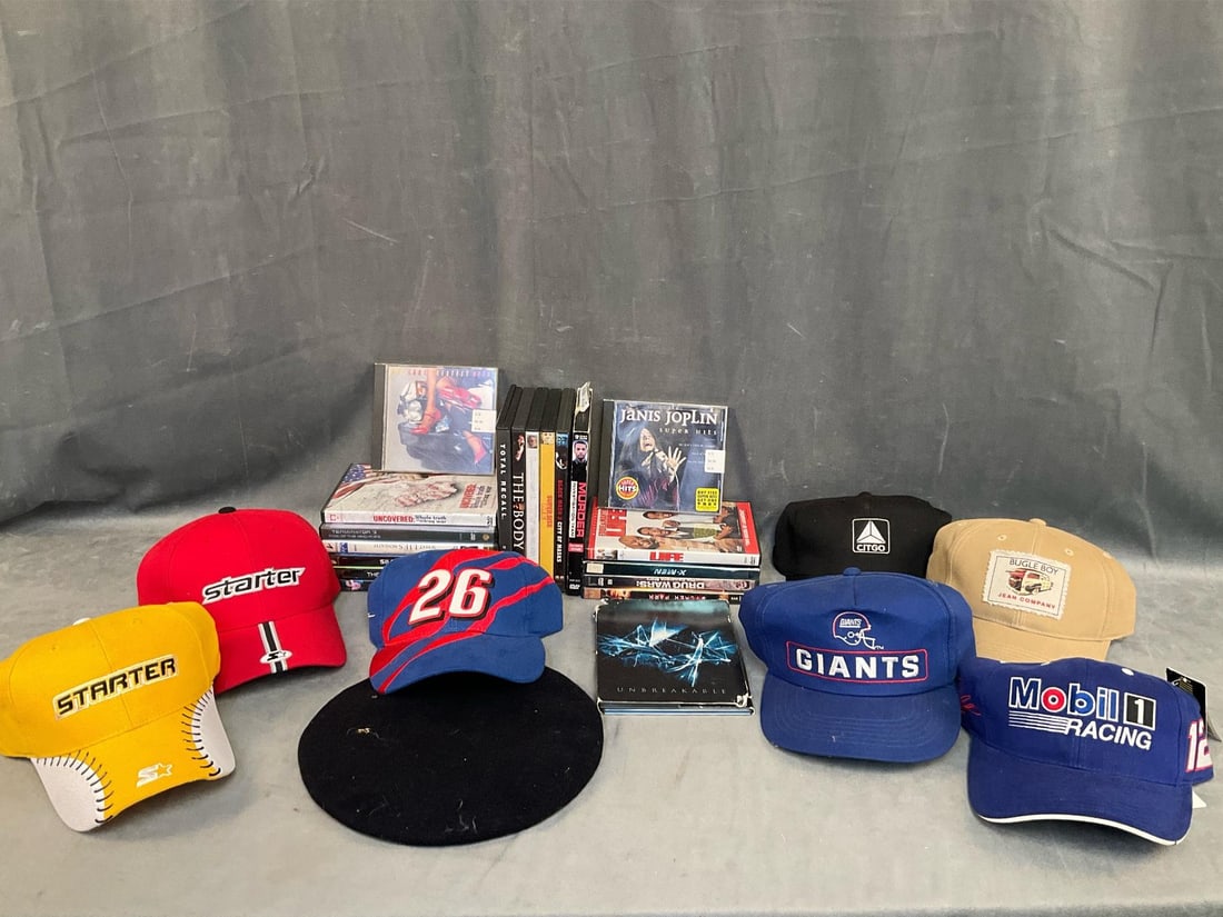 Assorted DVD's & Baseball Caps: Circa 1990's assorted lot of seventeen DVD's including "Wicker Park”, "Life”, "Silent Trigger” and more. Two CD's - Janis Joplin, and The Cars. Eight hats - Mobile 1 Racing, #26