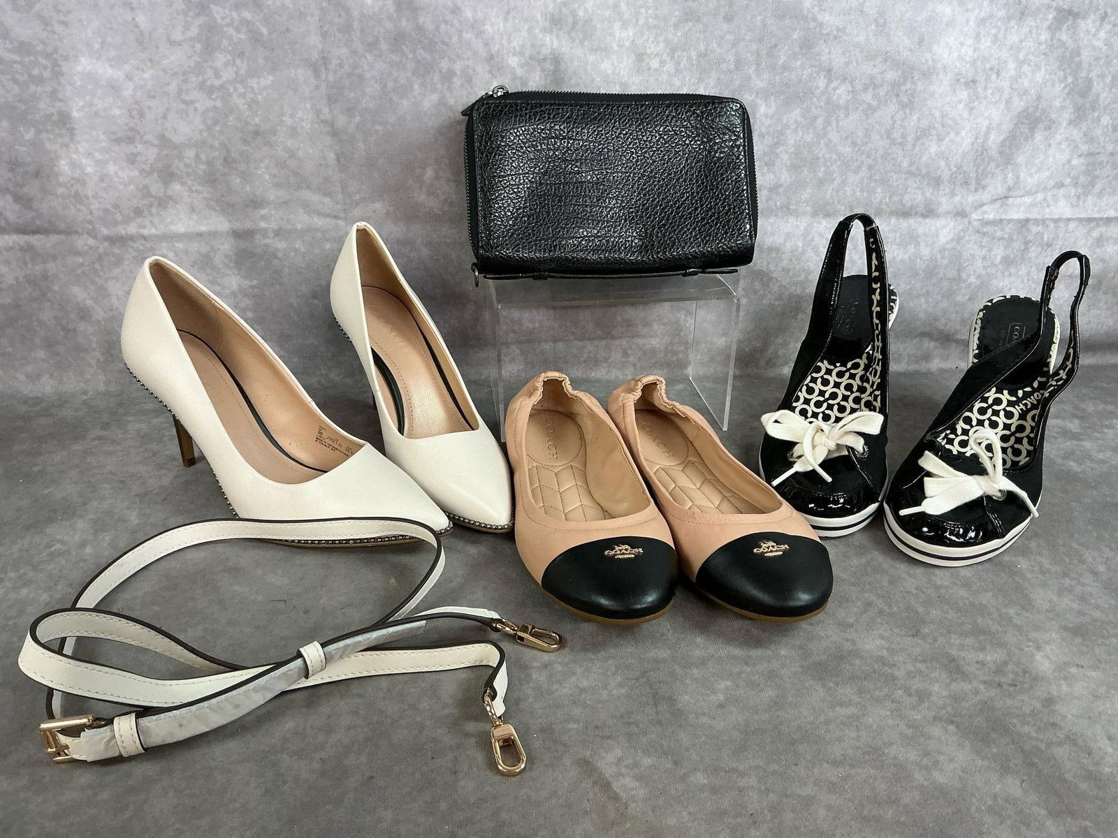 Coach Shoes, Travel Organizer, & Handbag Strap: Three modern pair of Coach shoes, leather strap, and zip bag. Shoes are 9.5B size, including "Bonnie" ballet flats and "Emilanna" black patent wedge. Also 9B size off-white heels, black double zip