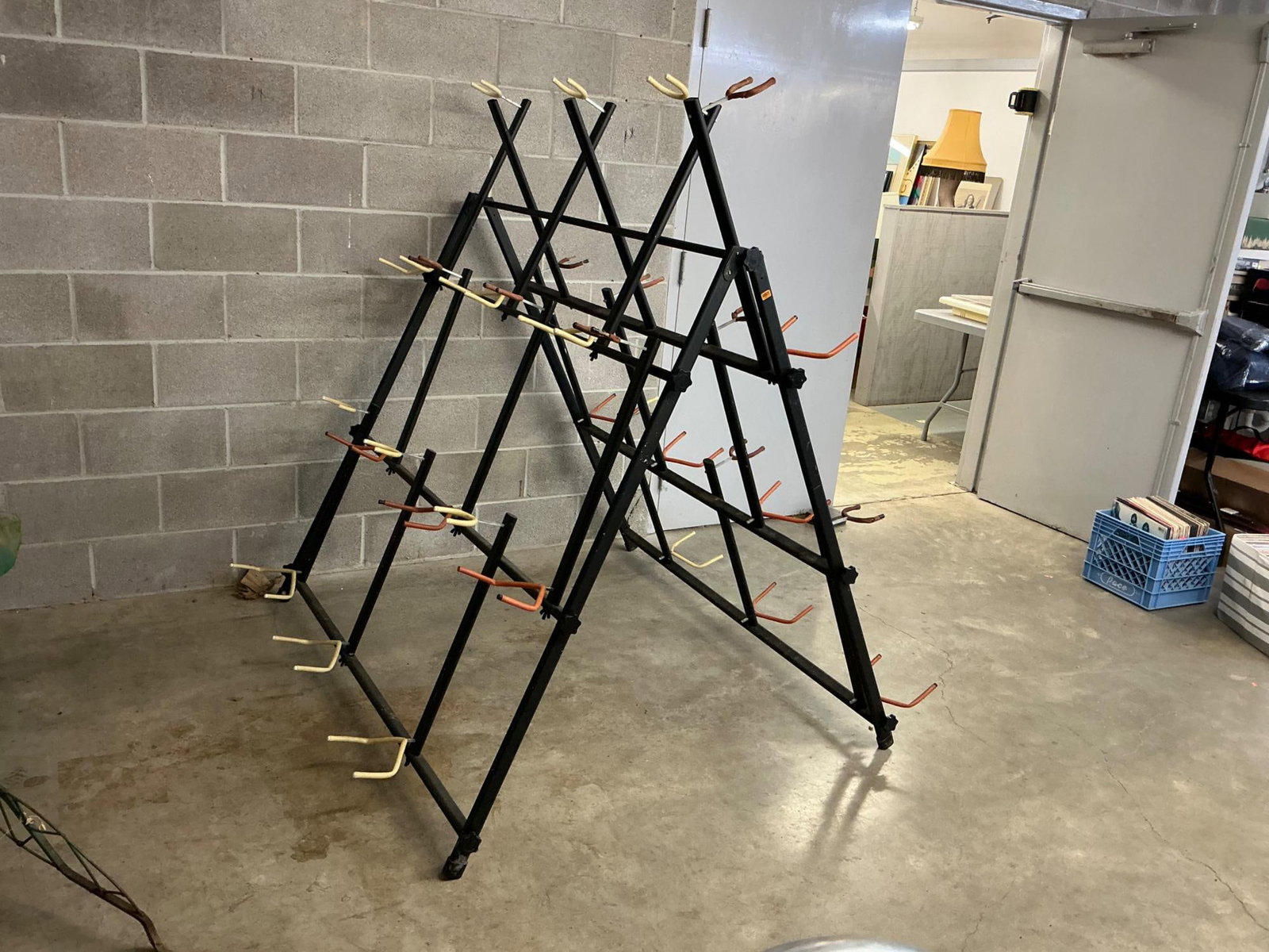 Multi Guitar Stand: Large guitar stand that holds multiple guitars. Missing four holders but otherwise good condition. Measures 50 inches deep x 58 inches wide x 64 inches tall, assembled.
