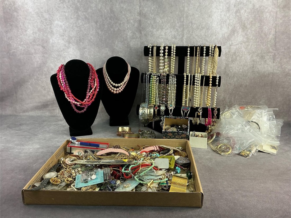 Costume Jewelry: Costume jewelry mainly unsorted with a lot to go through. All in fair to good condition from what can be seen. Box measures 14 inches wide x 10 inches tall.