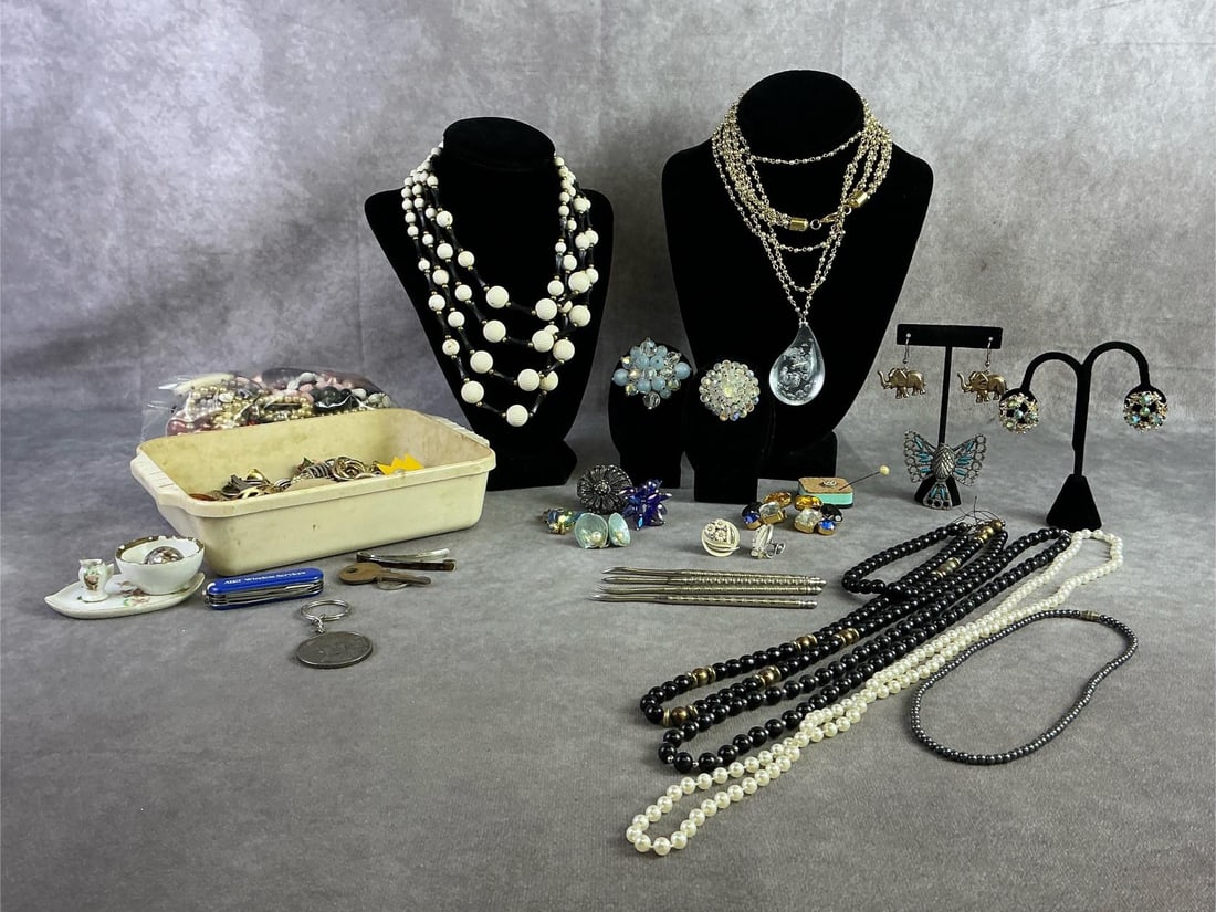 Costume Jewelry: Smaller costume jewelry lot with several unpaired earrings and a bag of broken necklaces with loose beads. All in fair to good condition. Container of earrings measures 7 inches wide x 5.45 inches