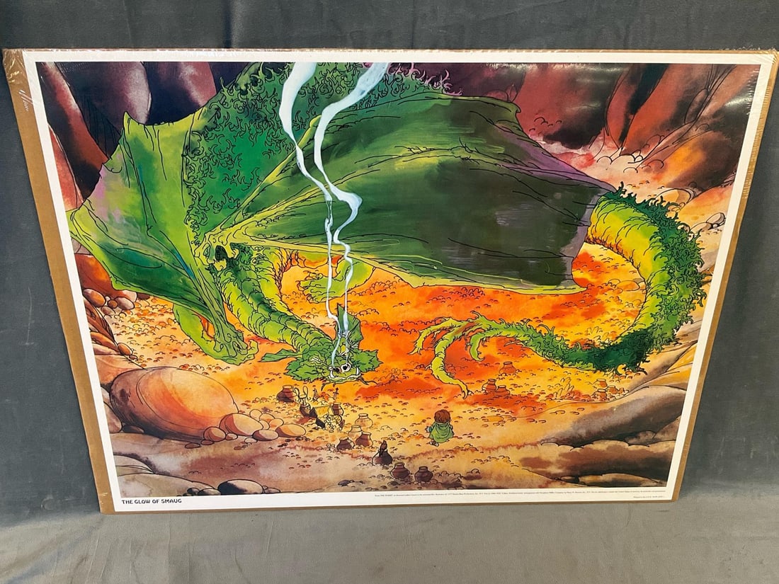 Vintage Hobbit Poster: 1977 "The Hobbit” Poster. An illustrated edition based on the animated film. New condition with plastic wrap and cardboard backing. Measures 26 inches wide x 20 inches tall.