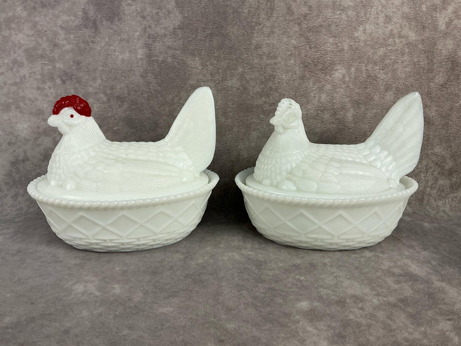 Hens on Nest: Two vintage milk glass hens on nest. The painted one is marked Westmoreland under lid, the other is unmarked. Westmoreland in good condition, other has a crack only on the inside of base and is not