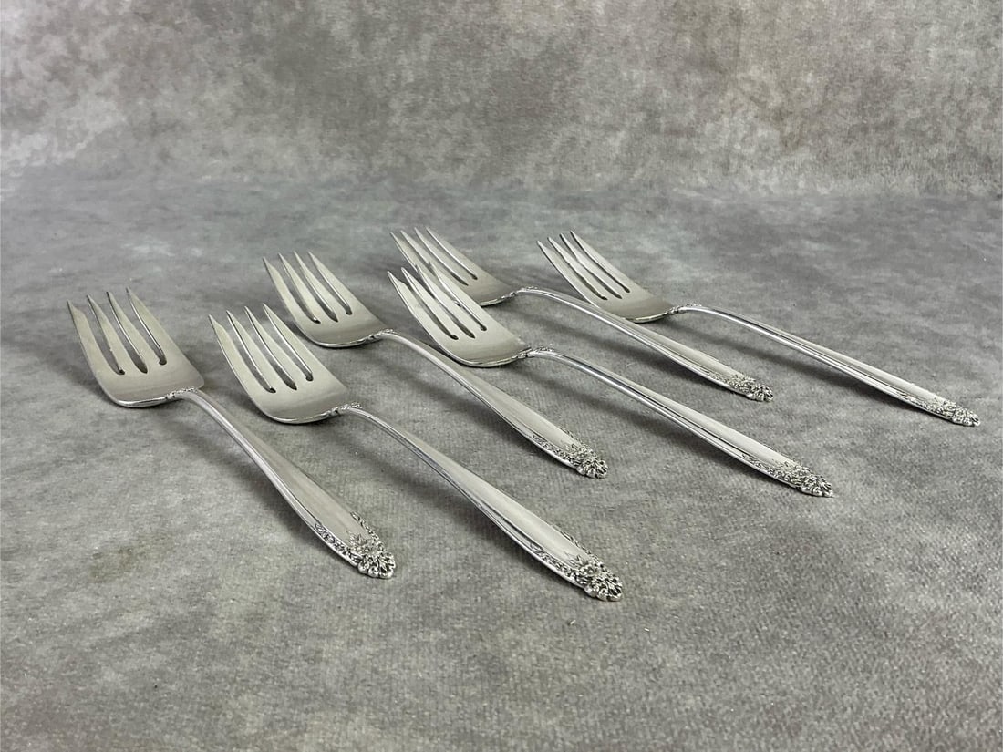 Sterling Salad Forks: Six Sterling silver salad forks made by International and patterned in Prelude. All in good condition, stamped with oxidation present. Total weight 7.05 ozt.