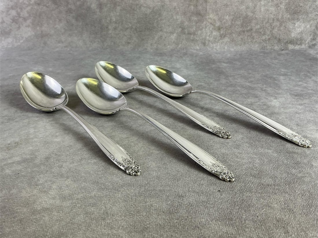 Sterling Serving Spoons: Four Sterling silver serving spoons made by International and patterned in Prelude. All in good condition, stamped with oxidation present. Total weight 8.50 ozt.