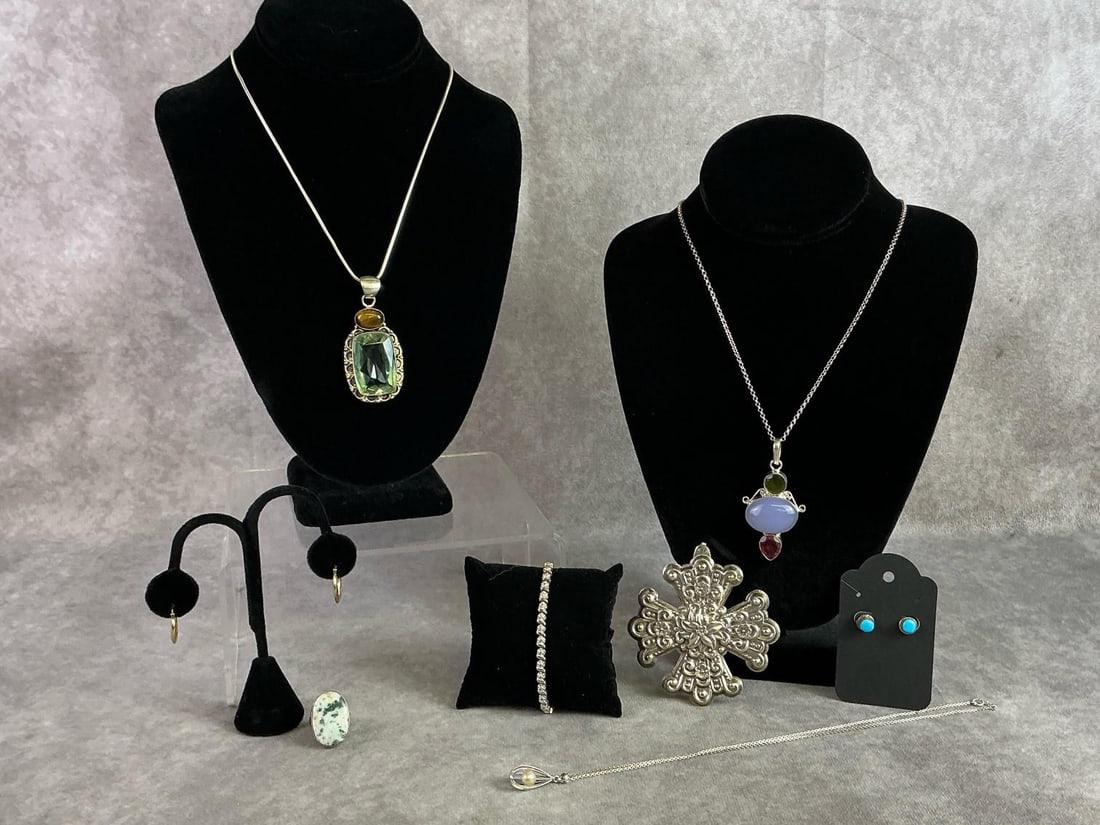 Sterling Silver Jewelry: Sterling silver jewelry including three necklaces, one pendant, two pairs of earrings, one bracelet and one ring. All in good condition, stamped with oxidation present throughout. Total weight 2.6