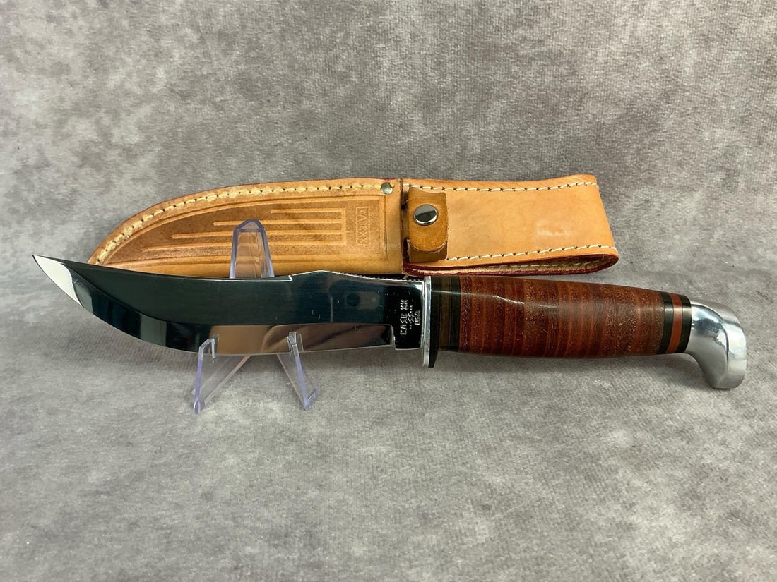 Case XX Knife: Case XX fixed blade knife. Cutlery hunter, patterned 323-5ss, sheath included. Sheath measures 1.5 inches wide x 9.5 inches tall.