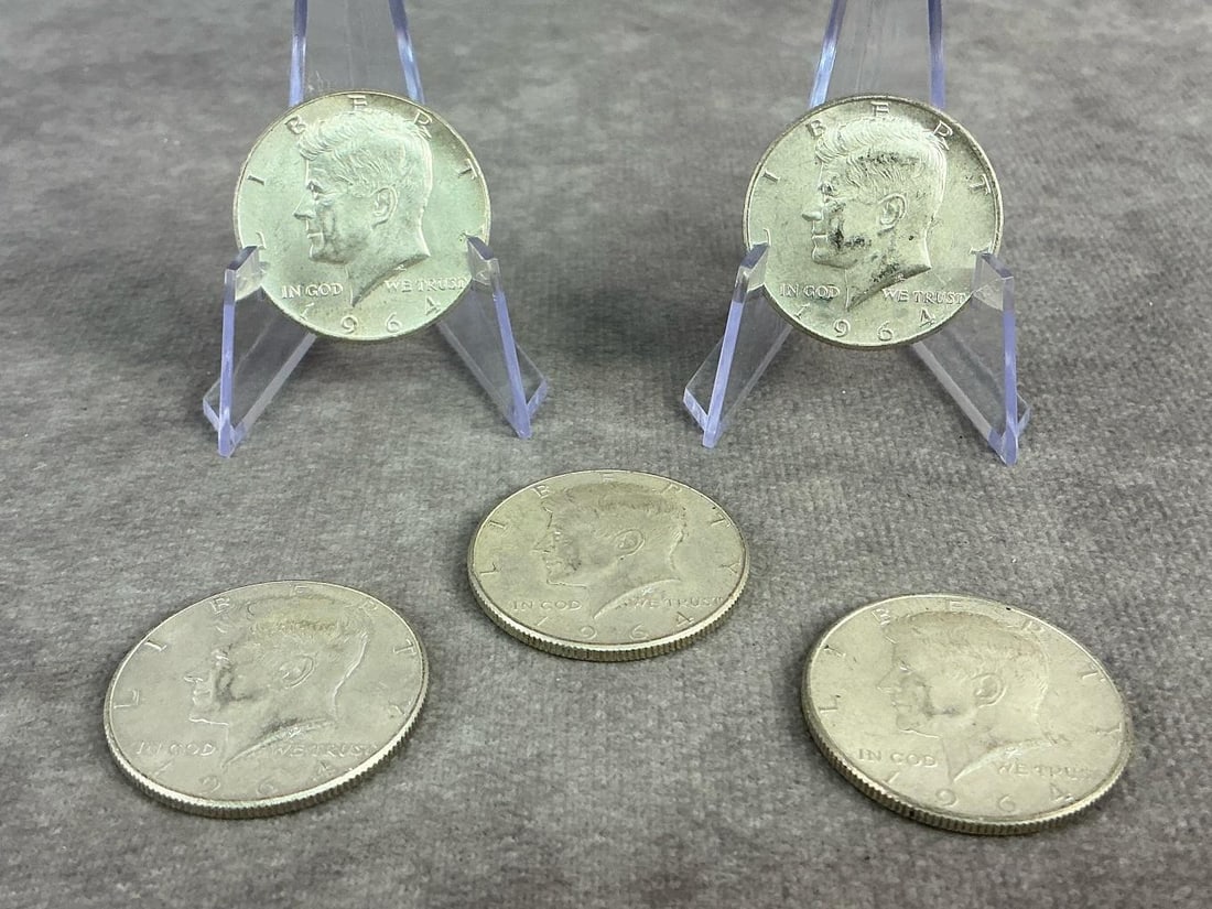 Kennedy Halves: Five 1964 United States Kennedy Half Dollars, the first year of issue for this design and composed of 90 percent silver. All in good circulated condition. Total weight 2.0 ozt.