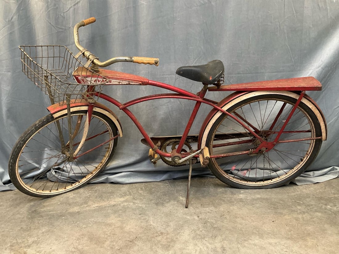 Vintage Bike: Circa 1960 Evan's Viscount 200 bicycle with basket and headlight. Surface rust, flat tires, and general wear. Measures 69 inches wide x 24 x 35 inches tall.