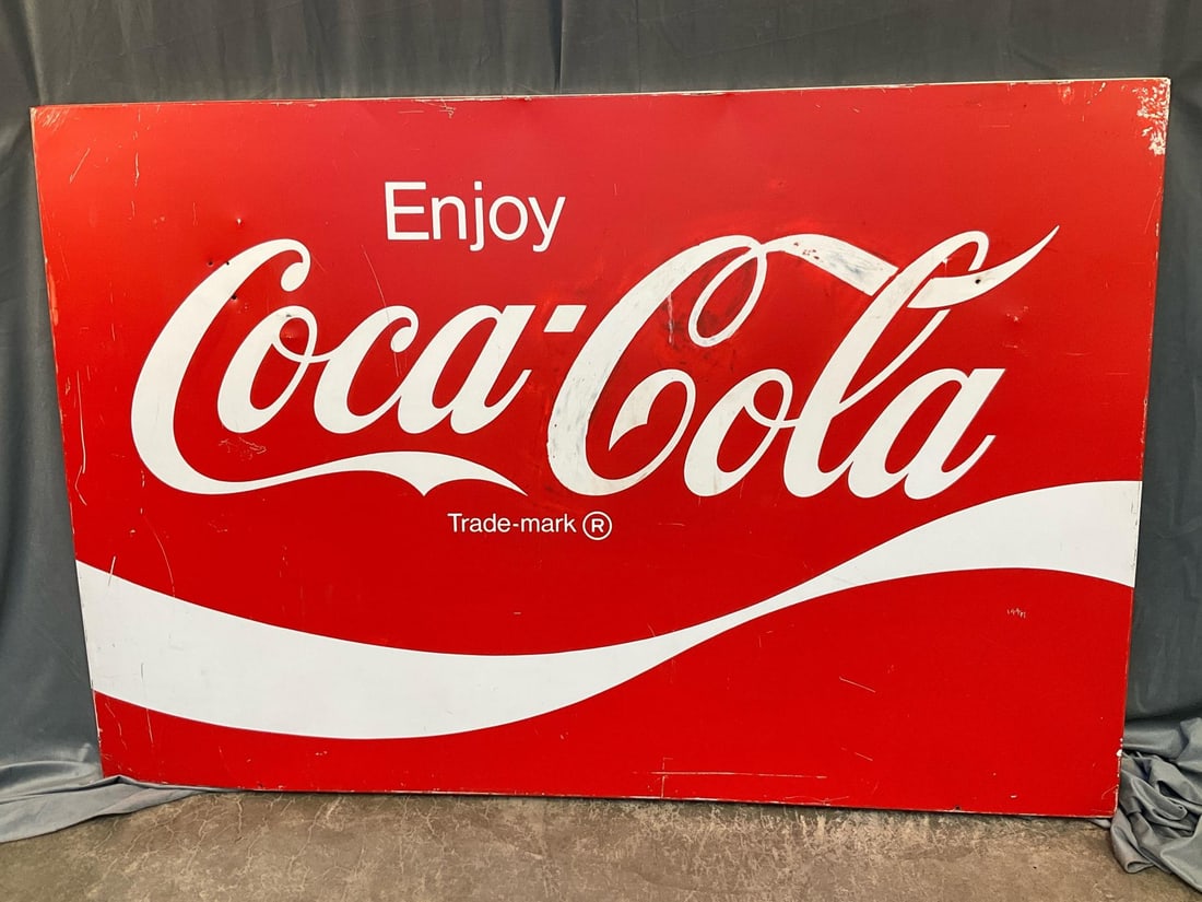 Vintage Metal Coca Cola Sign: Circa 1970's - 1980's ""Enjoy Coca-Cola" metal box sign. Minor paint touch ups, scratches, bullet holes and small dents, otherwise good condition. Measures 66 inches wide x 1.25 x 44 inches tall.
