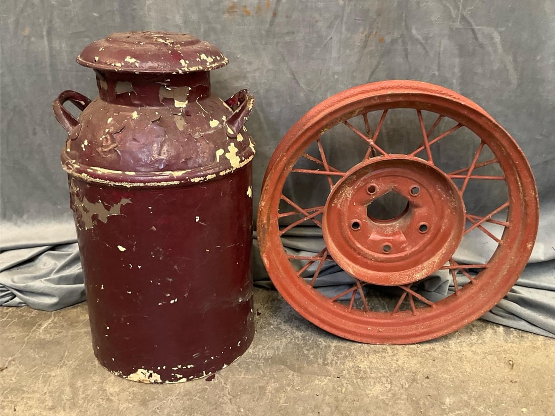 Model A Wheel/Dairy Can: One mid-20th century dairy can with cap. Used condition. One circa 1930 model A welded spoke wheel. Good condition. Wheel measures 20.5 inches in diameter x 4 inches wide.