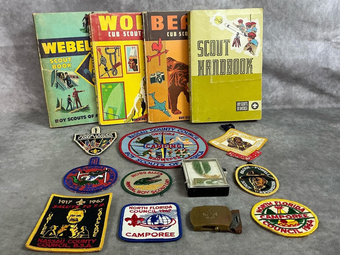 Vintage Scouting Books & Patches: Four books and 10 patches or badges and belt buckle from 1950's - 1970's. North Florida council patches, Scouter's Training Award in case, handbooks and buckle. Items used and show slight wear. Books