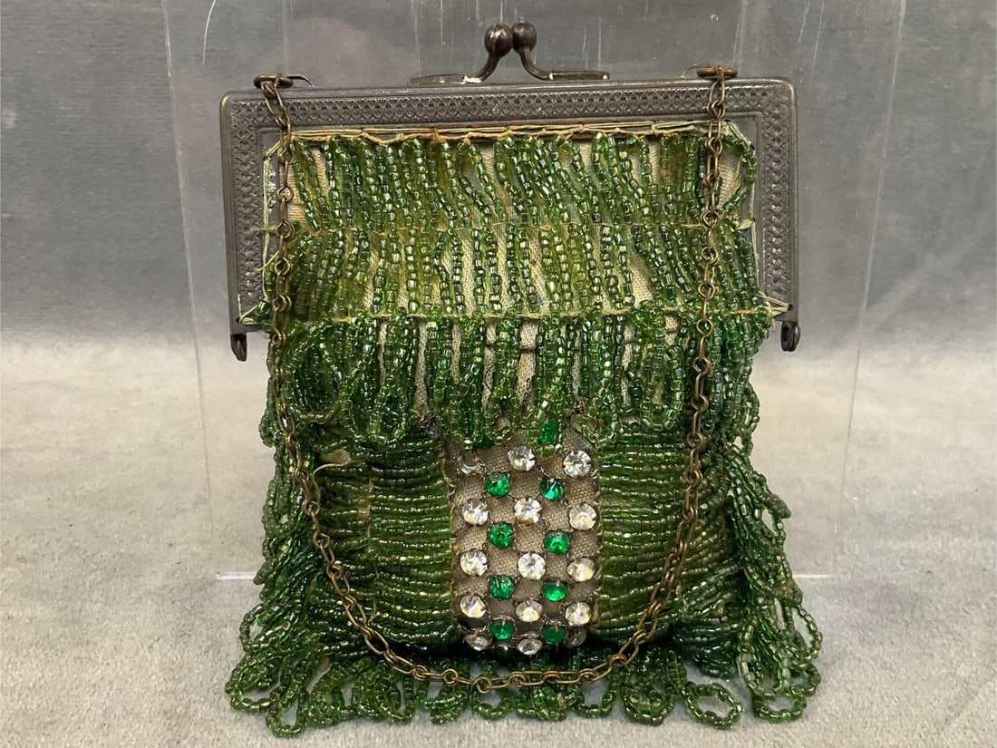 Art Deco Beaded Purse: Circa 1920's Green Glass Beaded Evening Purse with stamped metal frame, rhinestones, and silk fabric lining. Included is a period engraved copperplate for calling cards with an illegible name. Good