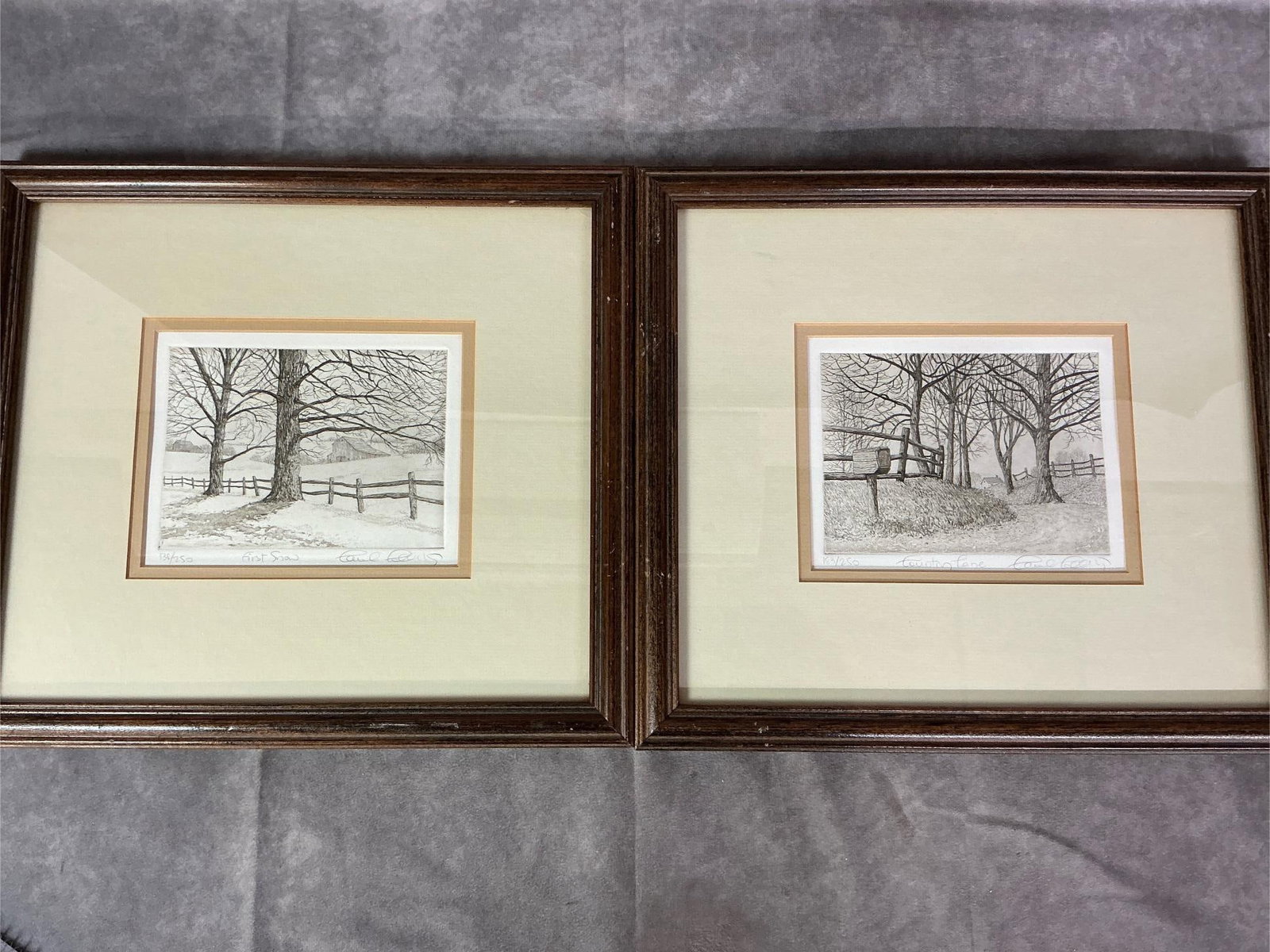 Drawings by Carol Collette: Two 1980's pen and ink prints by Carol Collette. First Snow is numbered 138/250 and Country Lane is numbered 183/250. Both matted and framed and in good condition. Each measures 14 inches wide x 1 x