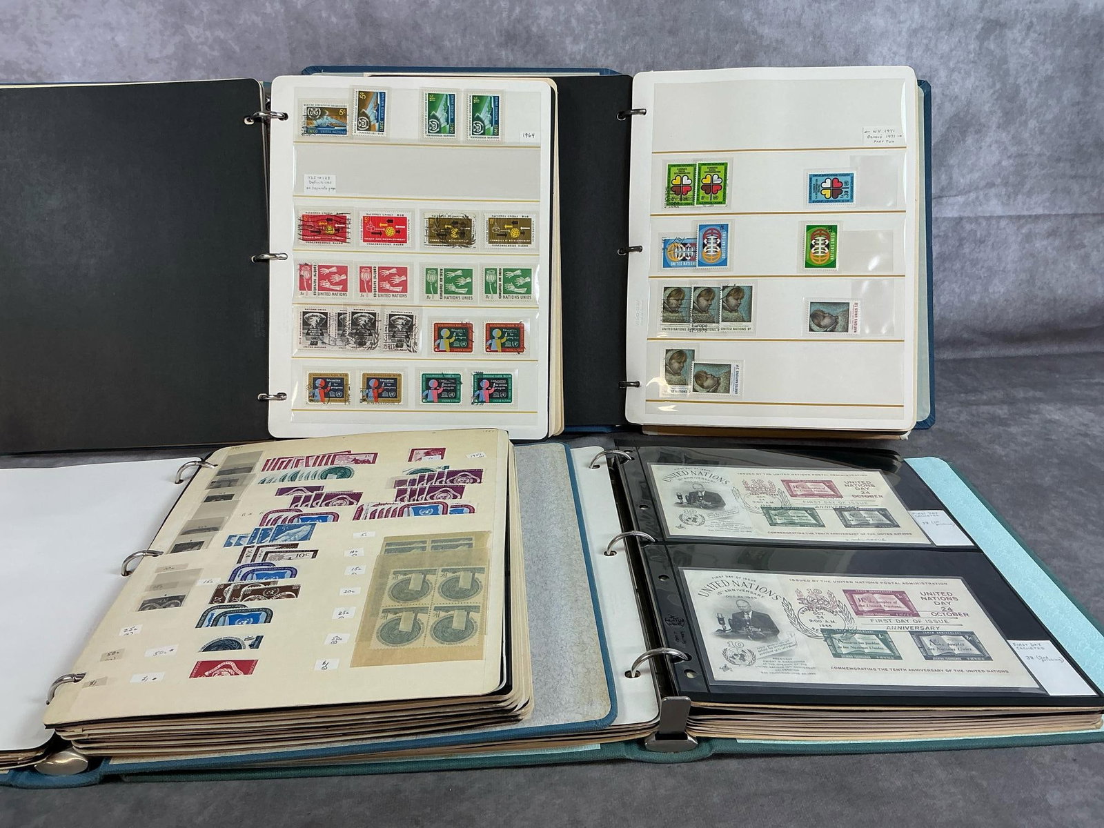 United Nations Stamps Collection: Four binders containing 100's of stamps from 1952 - 1979. United Nations commemorative issue stamps with some first day issue cards. Includes "definitives and air mail". Binders broken into dates and