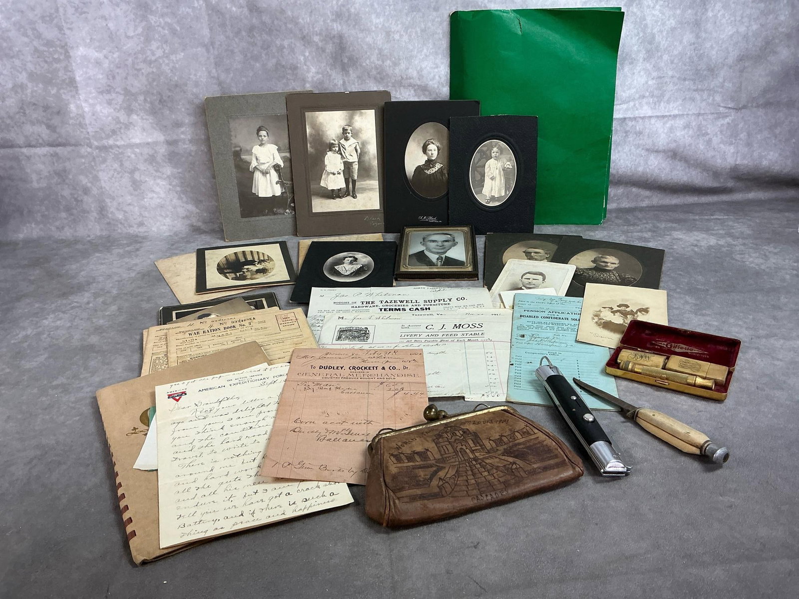 Whitman Family Treasures: Late 1800's to early 1900's pictures, receipts, letters, knives, and more. Receipts and papers mostly from James P Whitman. Various family photos and correspondence. Includes a personalized 1910