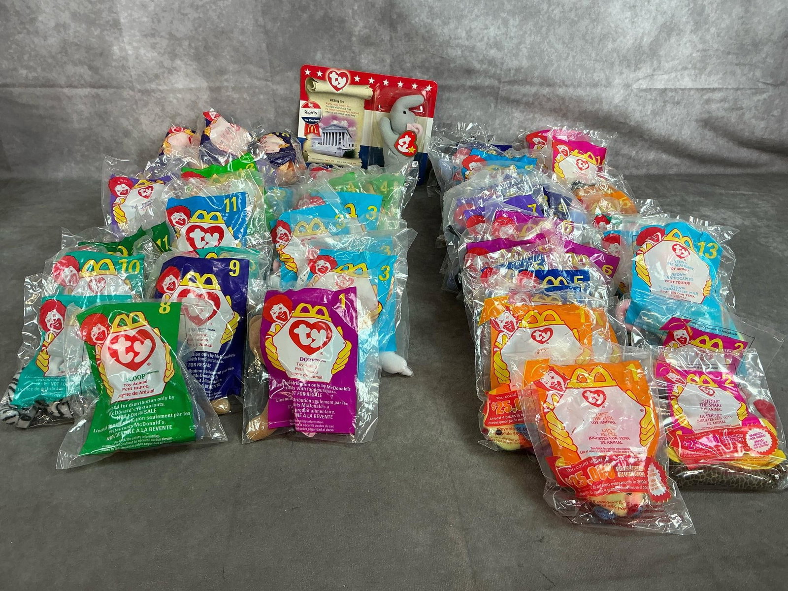 McDonald's Ty Toys: Sixty Happy Meal toys from 1998-2000. Ty toy animals, reptiles, bugs and more. In original packaging. Average size package 4 inches wide x 5 inches tall.