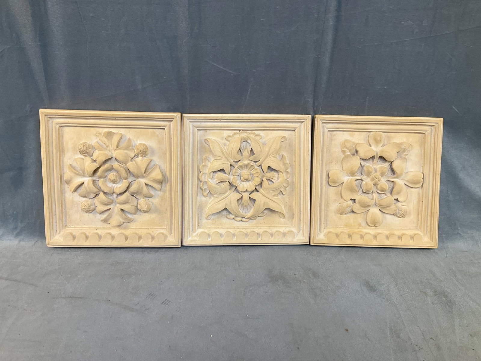 Plaster Wall Plaques: 1985 Set of three plaster of Paris wall hanging decorative plaques. Marked ""House Parts Inc. 1985". Good condition. Measures 10.5 inches wide x 1.25 x 10.5 inches tall.