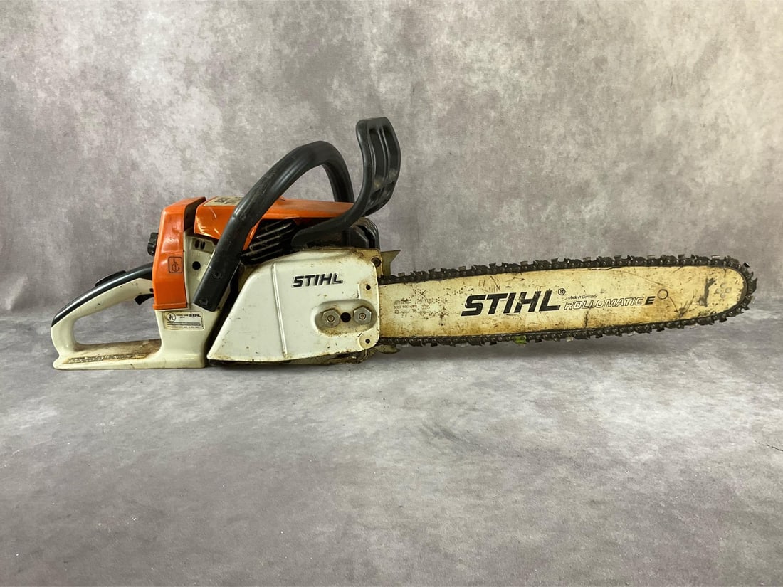 Stihl Chain Saw: Model 026 16 inch gasoline chain saw. 48.7 cc engine with 3.5 HP. Used, untested, otherwise in good condition. Measures 32 inches long X 9 inches wide X 11 inches high.