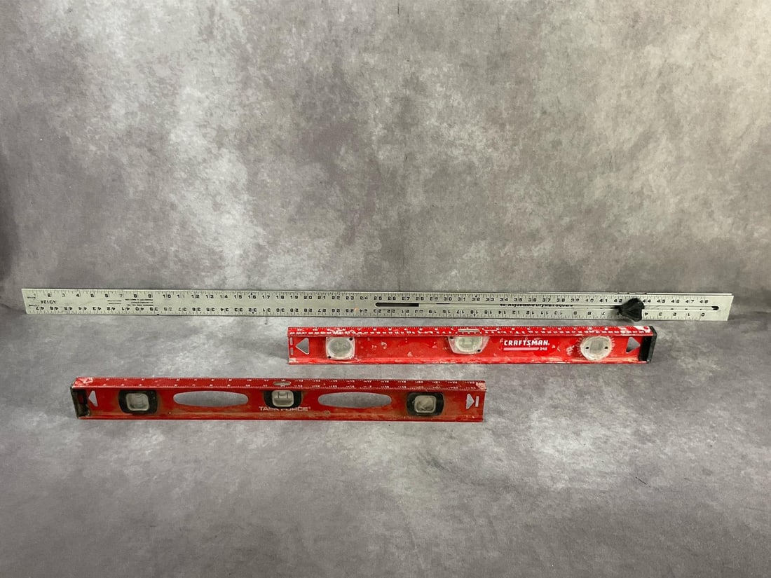 Craftsman, Task Force Levels & Swanson Square: Two 24 inch levels, both missing end caps and one Swanson 48 inch adjustable drywall square. All three used, otherwise in good condition. Largest item 48 inches long X 2 inches wide X 7/8 inch high.
