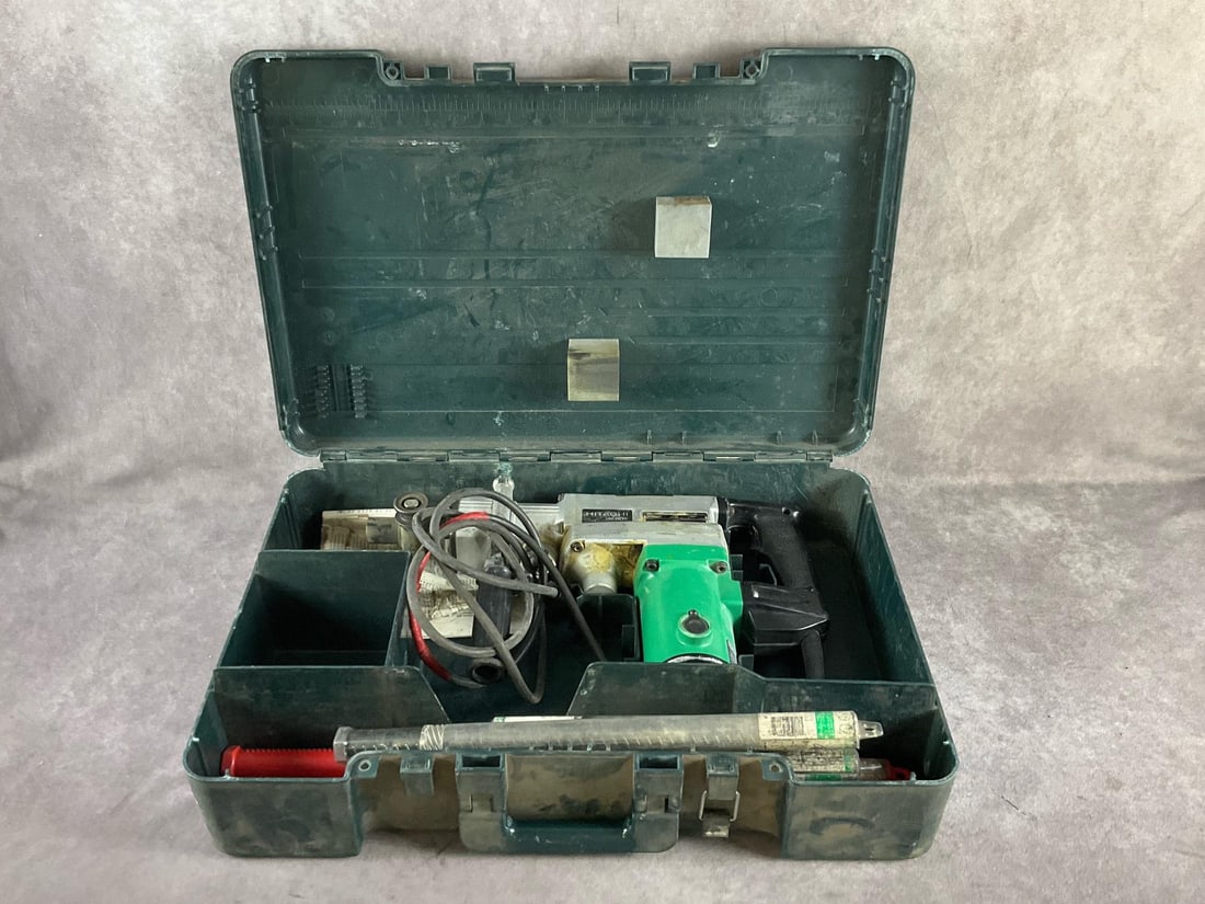 Hitachi Hammer Drill: DH 38YE Spline shank rotary hammer. 120 volt 8 amp. Used, powers up and in working condition. Includes 3/8; 1/2 and 5/8 inch Bits. Case maasures 24 inches long X 16 inches wide X 6 inches deep.