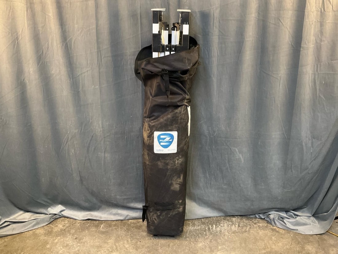 Pop Up Tent: Everest Z-Shade Company Pop Up 10 x 10 Tent. Not tested. Folded measures 11 inches wide x 8 x 58 inches tall.