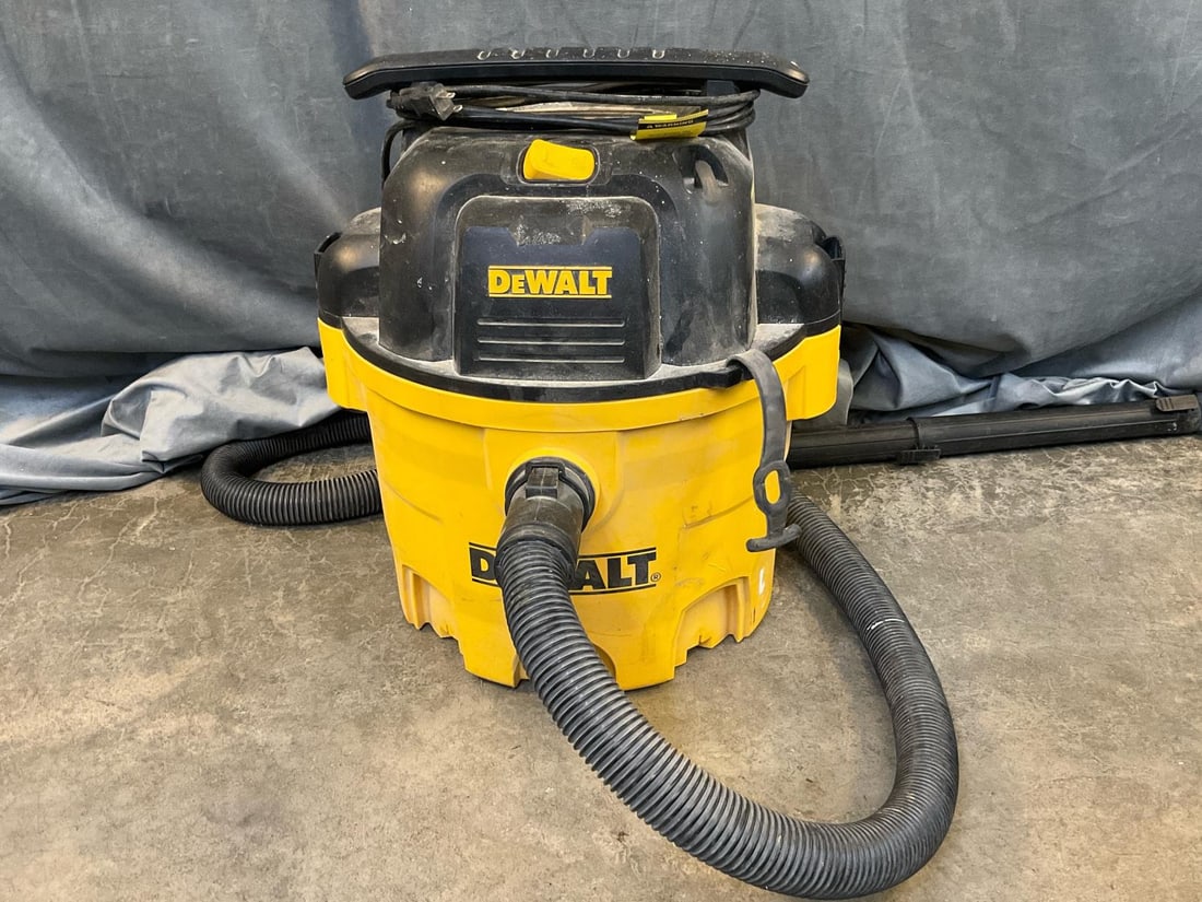 DeWalt Wet/Dry Vac: DeWalt Wet/Dry 9 Gallon Vacuum. Missing hose attachments, taped electrical cord, used condition. Tested and works. Measures 19 inches in diameter x 20.75 inches tall.