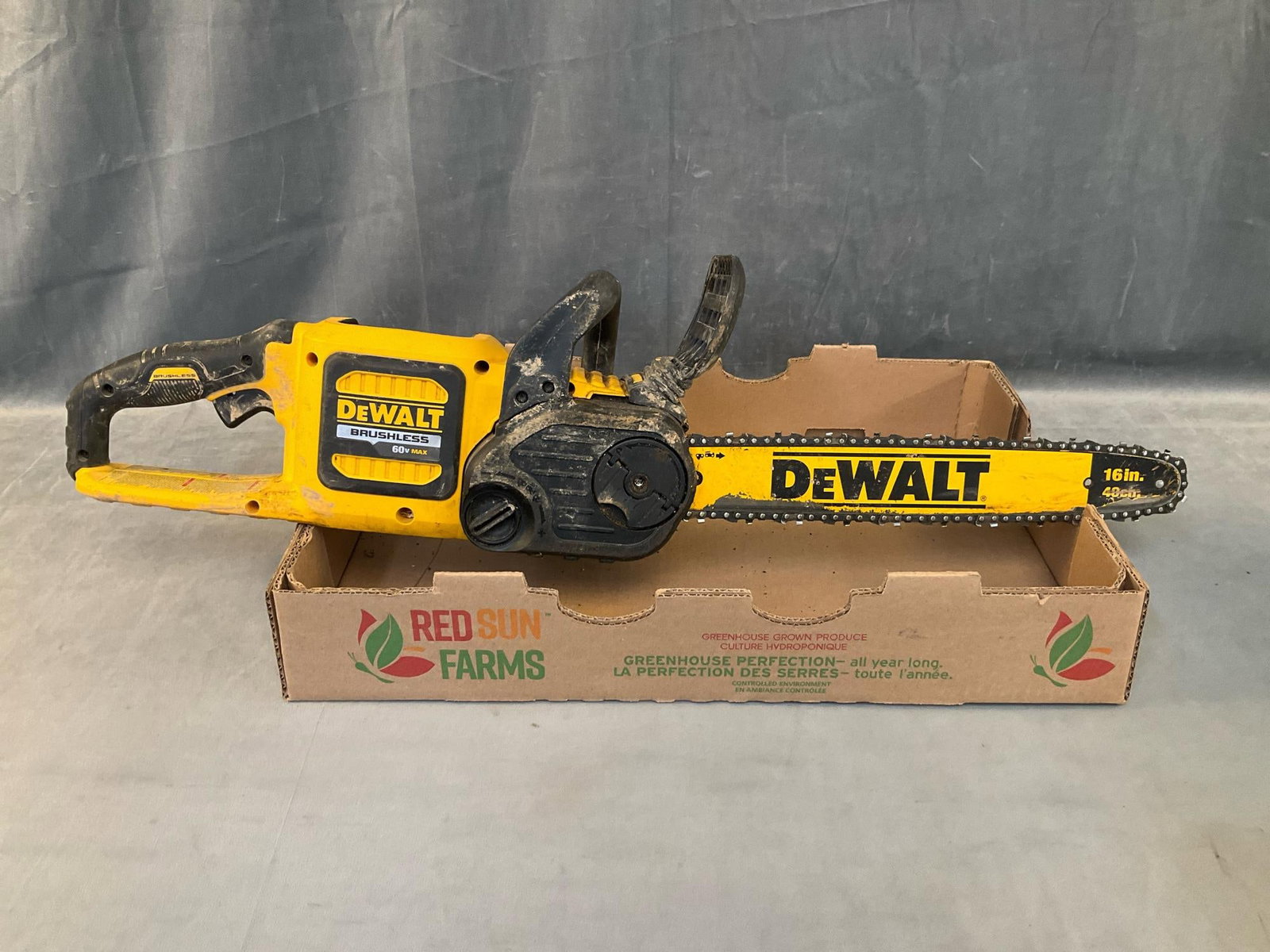 DeWalt FlexVolt Chainsaw: DeWalt FlexVolt 16 inch Brushless Chainsaw with assorted drill bits and DeWalt reciprocating saw blades. Chainsaw missing battery pack and not tested, leaking oil. Chainsaw measures 34 inches wide x 1