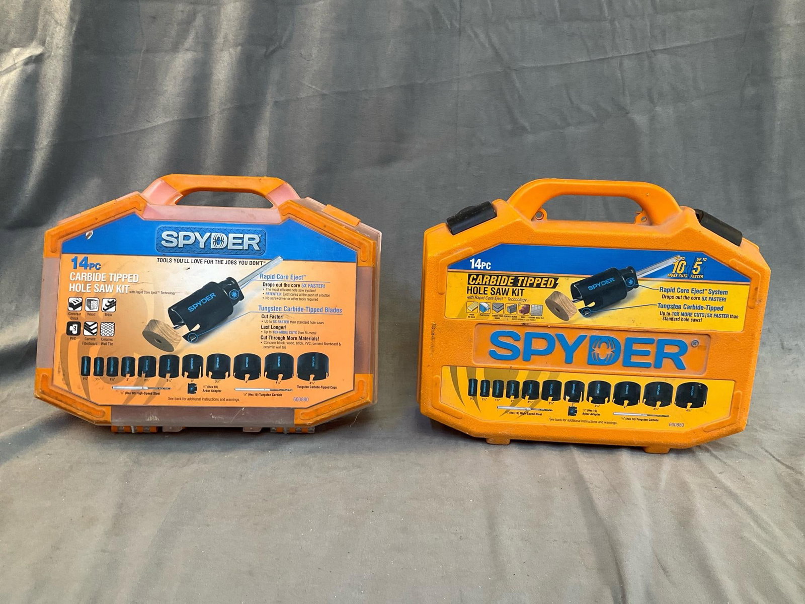 Hole Saw Kit: Spyder 14 piece carbon tipped hole saw kit 600880. One kit with thirteen pieces, one with seven pieces. Used condition. Plastic case measures 13 inches wide x 4 x 10 inches tall.