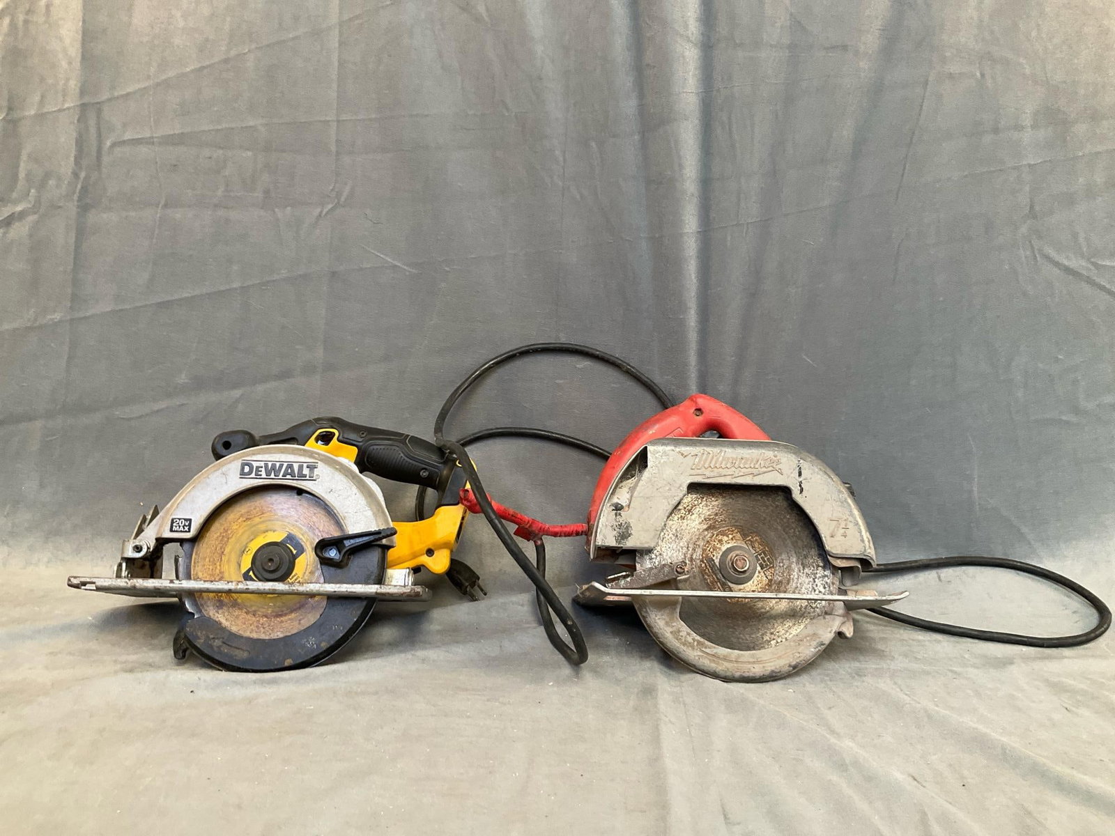 Circular Saws: One Milwaukee electric 7 1/4” heavy duty circular saw. Used condition with taped cord, tested works. One DeWalt DCS392 6 1/2” 20 volt cordless circular saw. Used condition, tested and work