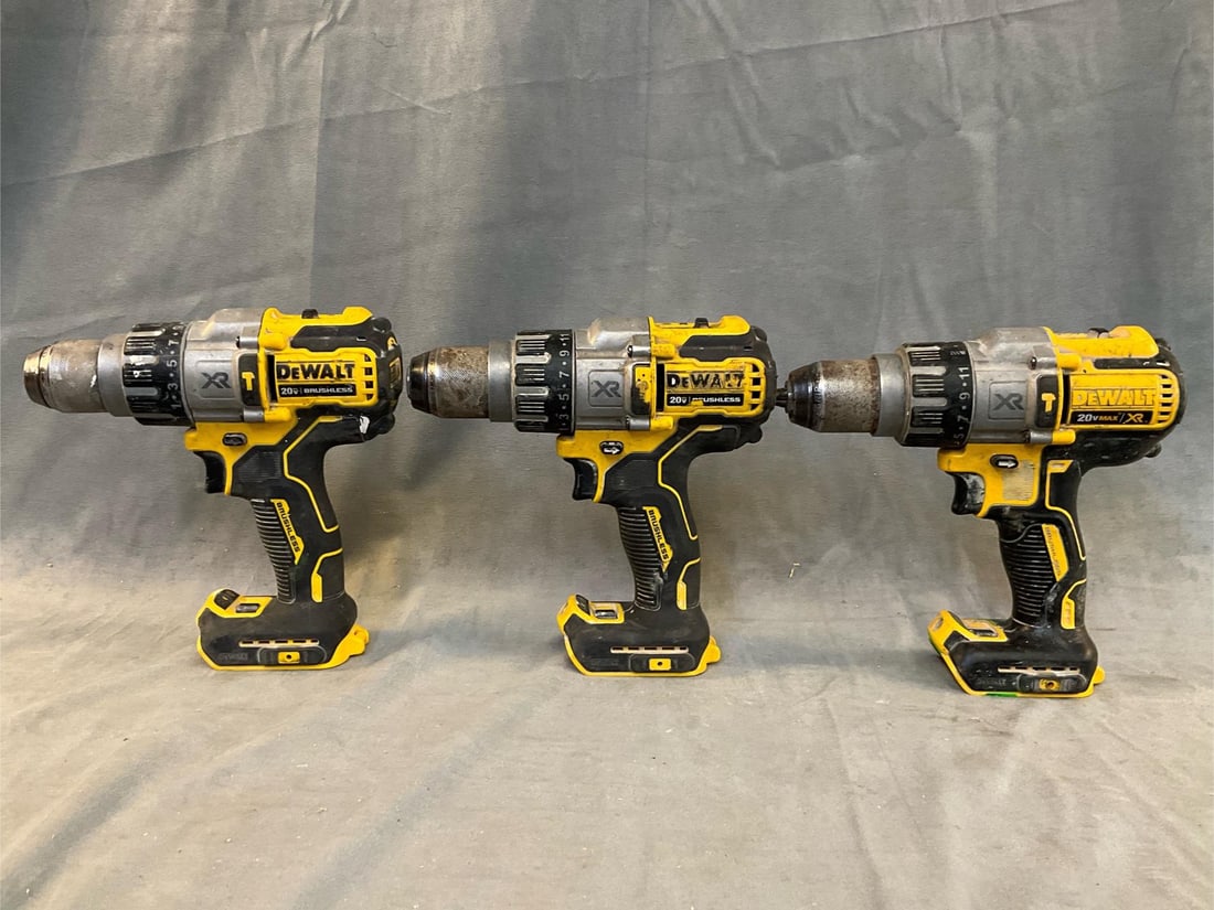 DeWalt Drill/Driver: Three DeWalt 1/2” cordless 20 volt hammerdrill / drill drivers. Two model DCD998 type 1 and one DCD996 type 2. Missing batteries. Used condition, tested and runs. Measures 8.5 inches wide x 2.5 