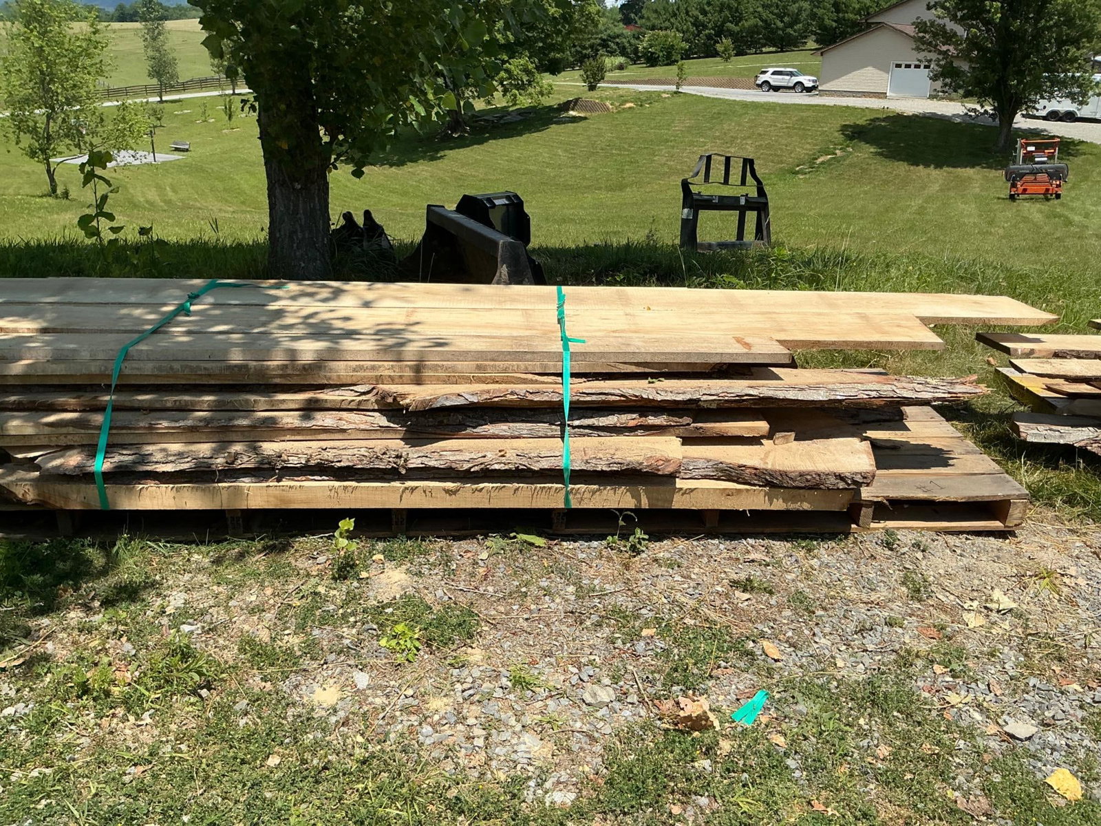 Rough Cut Maple Boards: Sorted mid to high grade maple rough cut boards. An assortment of 5/4 and 8/4 square cut and live edge boards. Approximately 500 board feet. Two years air dried, covered at all times. Located off