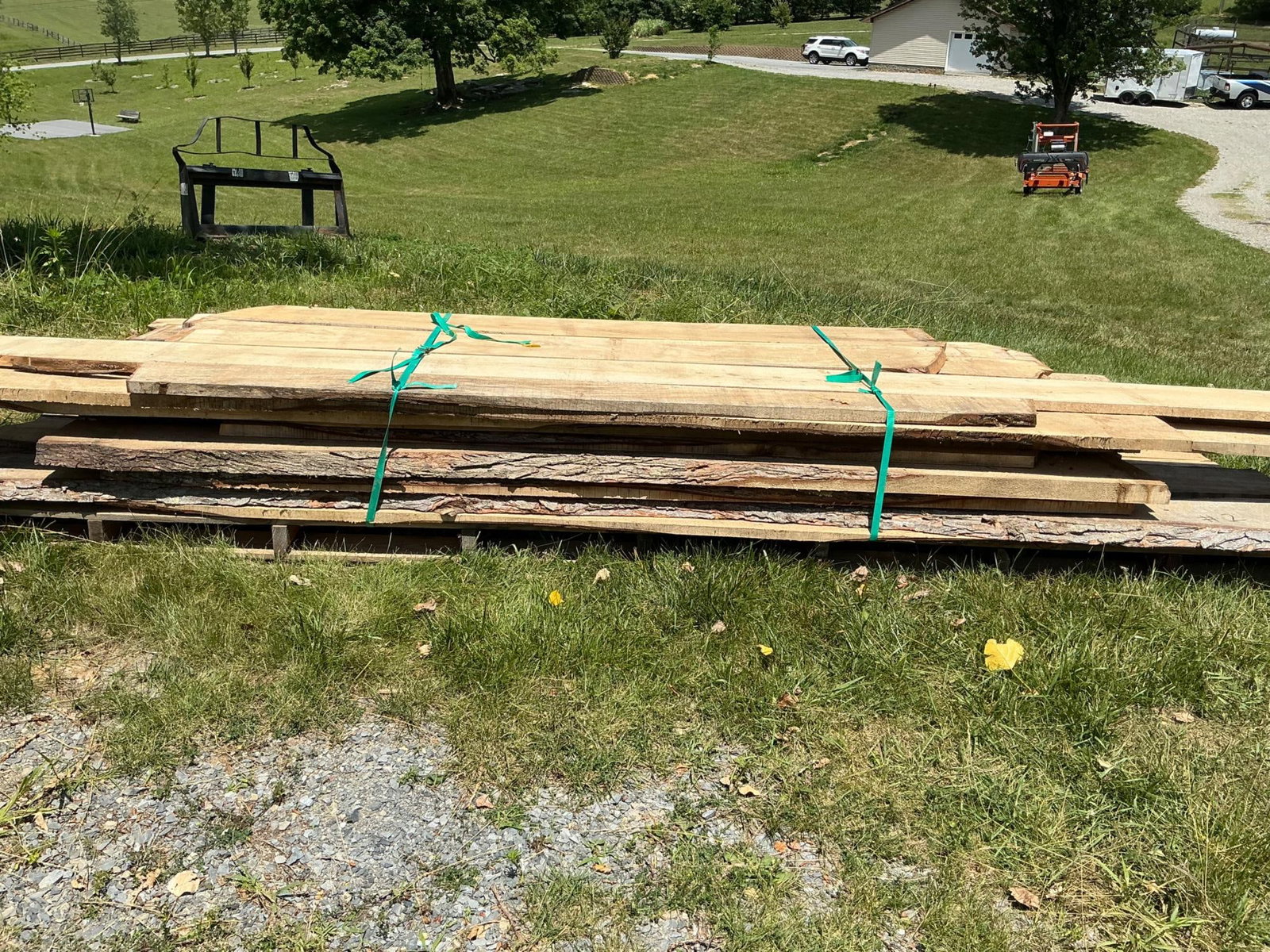 Rough Cut Maple Boards: Sorted mid to high grade maple rough cut boards. An assortment of 5/4 and 8/4 square cut and live edge boards. Approximately 500 board feet. Two years air dried, covered at all times. Located off