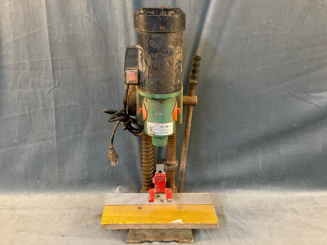 Mortising Machine: Bench top mortising machine. Used condition, powers on. Measures 13.5 inches wide x 11.25 x 25.25 inches tall.