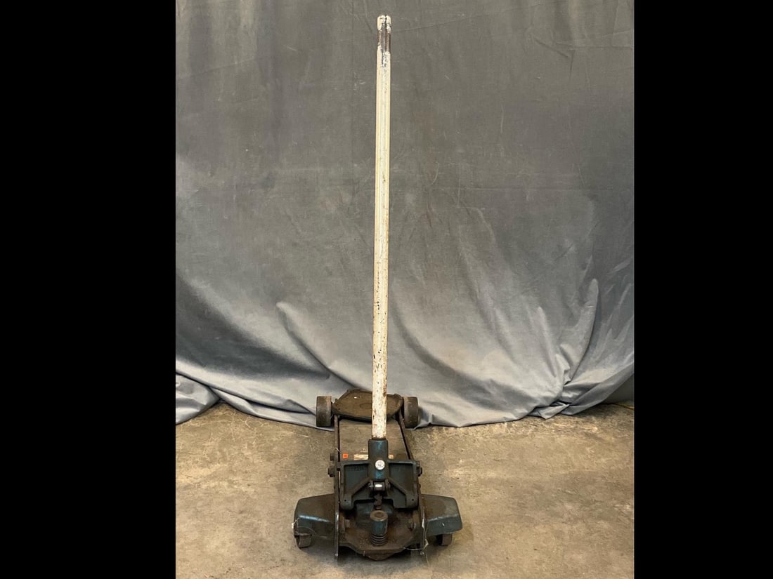 Sears Service Jack: Sears 1 1/2 ton service jack model 727-12102 . Used condition. Tested and works. Measures 29 inches wide x 15 x 6 inches tall.