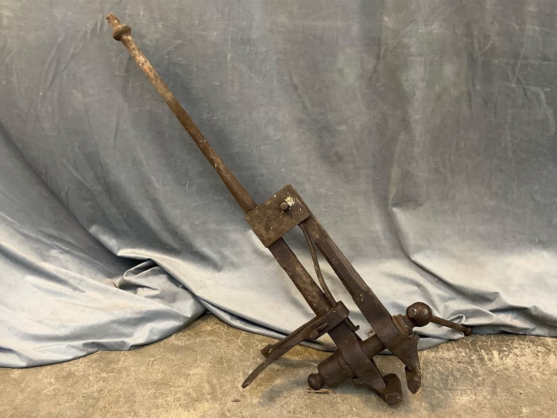 Blacksmith’s Leg Vice: Antique hand wrought blacksmith leg vice. Used working condition. Measures 40 inches wide x 16 x 17 inches tall.
