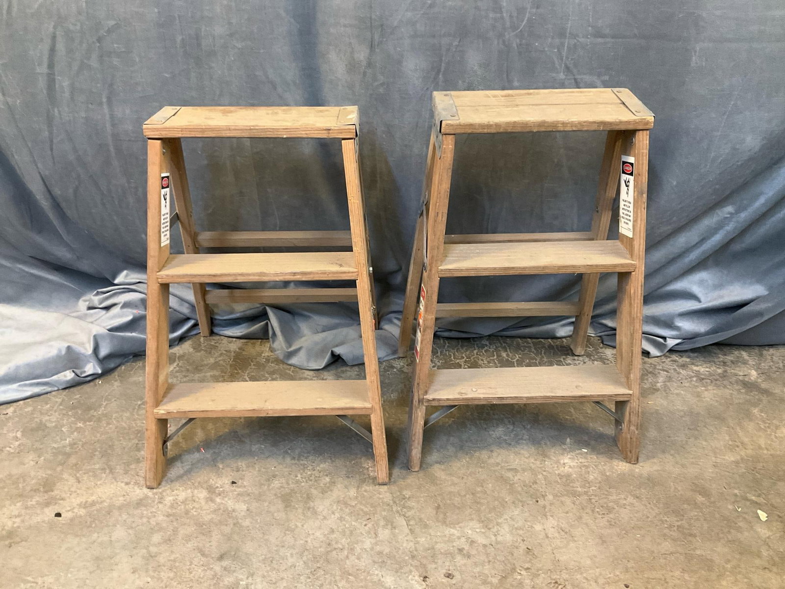 Werner Step Ladders: Two Werner Model W130-4 2ft. wooden folding step ladders. Used, good working condition. Folded measures 13 inches wide x 5.5 x 23 inches tall.
