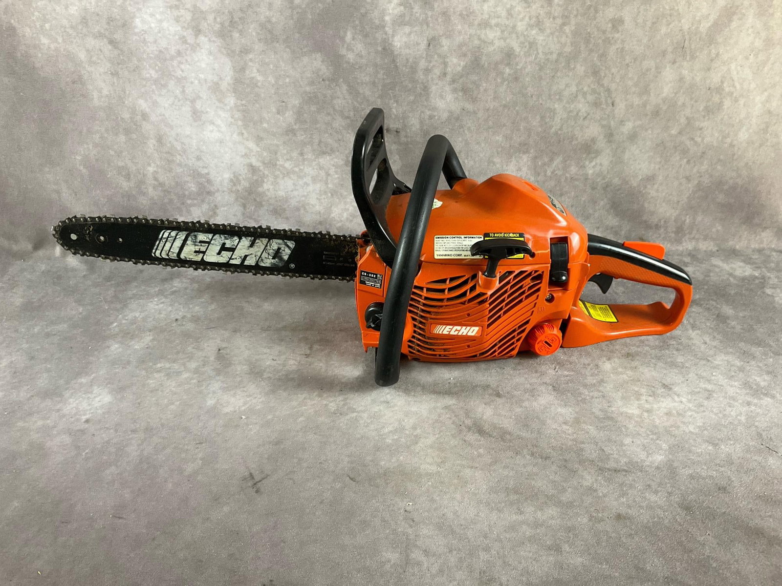 Echo Chainsaw: Model CS-352 34cc gas powered engine. Bar length 16 inch. Used , untested otherwise in good condition. Measures 31 inches long X 9 inches wide X 11 inches high.